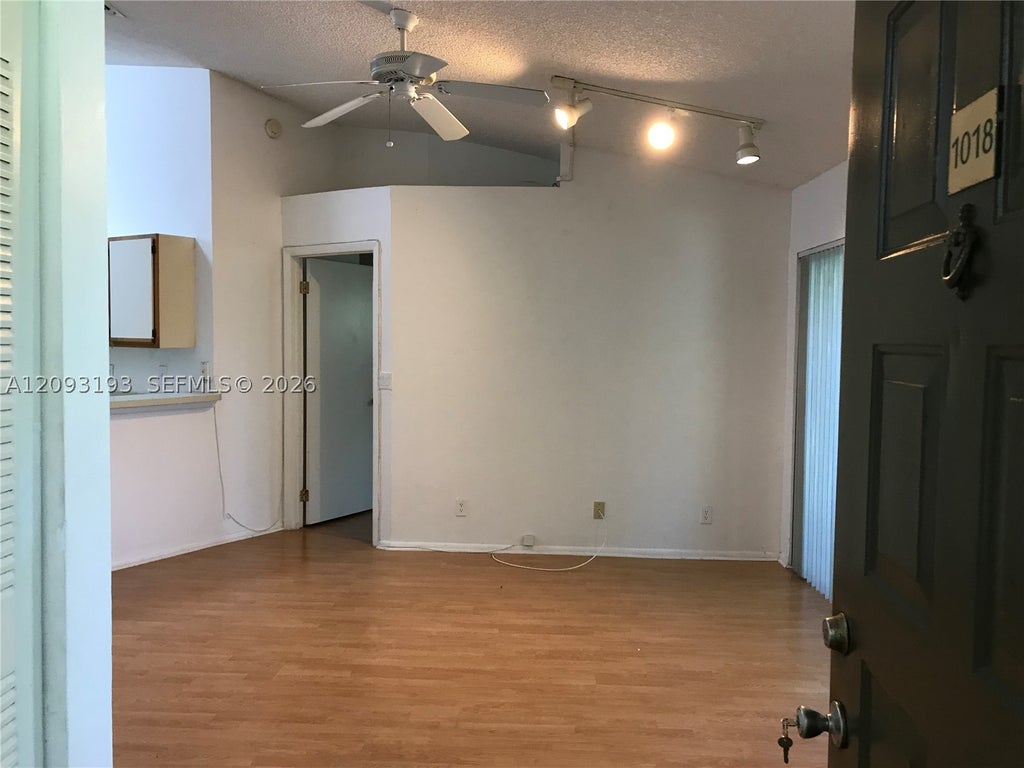 Photo of 9999 Summerbreeze Dr #1018, Sunrise, FL 33322 (MLS # A12093193)