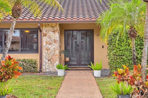 Photo of 311 NW 101st Ter, Coral Springs, FL 33071 (MLS # A11960923)