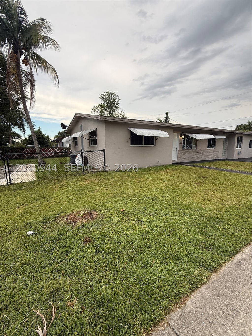 Photo of 300 SW 9th Ave #A, Hallandale Beach, FL 33009 (MLS # A12040944)