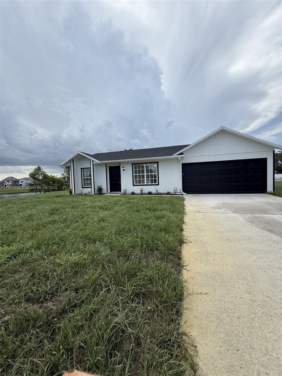 Welcome to this beautifully renovated 3-bedroom, 2-bathroom home located in the heart of Port St Lucie! Featuring brand new roof (2025), brand new tile flooring throughout. a modern kitchen with Quartz countertops, a large center island, new cabinetry, and stainless-steel appliances, this home is truly move-in ready. Sitting on a generous 0.28 acres lot, it offers plenty of outdoor space for entertaining or adding a pool. Plus enjoy the tranquility of a fishing pond next to the house. Nestled in a quiet, desirable neighborhood, conveniently located near Florida Turnpike and Interstate 95, and a new Hospital, this home offers both comfort and convenience. The property is vacant and easy to show. Don't miss this opportunity - schedule your showing today!!!