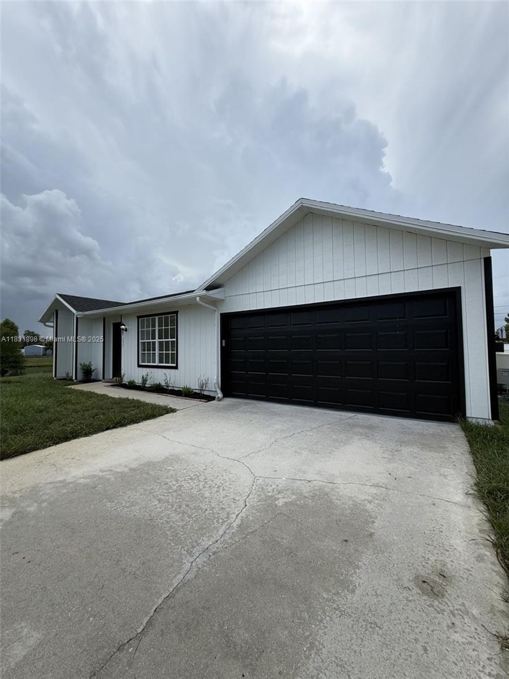 Photo of 135 SW Felix Ave, Port St Lucie, FL 34953 (MLS # A11831898)