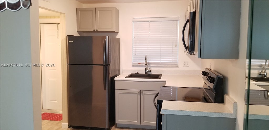 Photo of 8130 Sunrise Lakes Blvd #206, Sunrise, FL 33322 (MLS # A12044641)