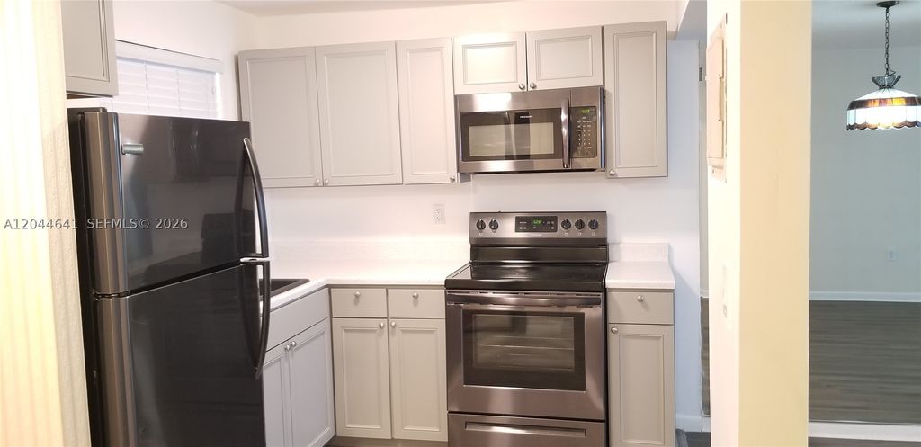 Photo of 8130 Sunrise Lakes Blvd #206, Sunrise, FL 33322 (MLS # A12044641)