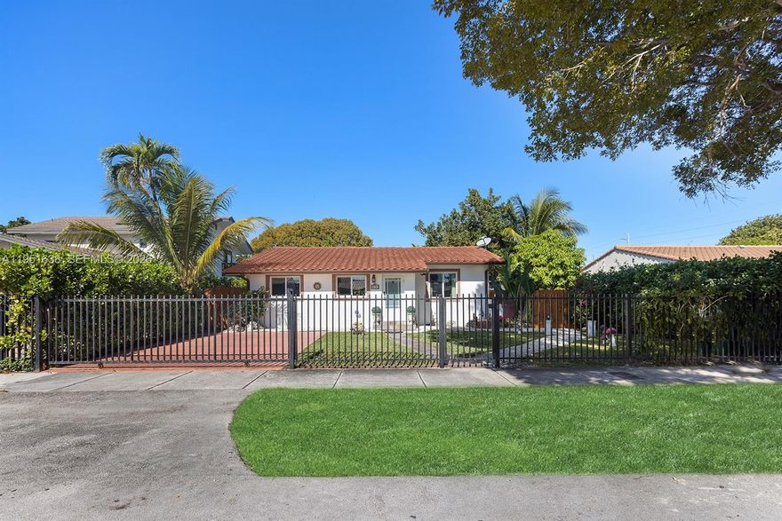 Renovated 3BR/2BA + extra room! in the Coral Gables area, minutes from Brickell and Miami International Airport. Move-in ready with above-ground jacuzzi, covered BBQ gazebo, and spacious paved backyard with mango, avocado, and guava trees, perfect for entertaining. Enclosed under AC Florida room ideal for office, gym, or lounge. Modern kitchen with stainless steel appliances and marble countertops. Impact windows, updated A/C, plumbing, and electrical. Separate laundry room, storage, and ample parking. Close to Miracle Mile, Downtown, shopping, and highways. Mobile home on side of lot may be included in sale.