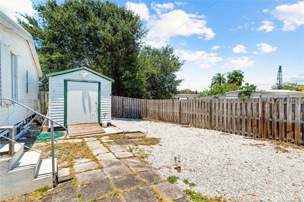 Photo of 7717 SE Swan Ave, Hobe Sound, FL 33455 (MLS # A12021096)