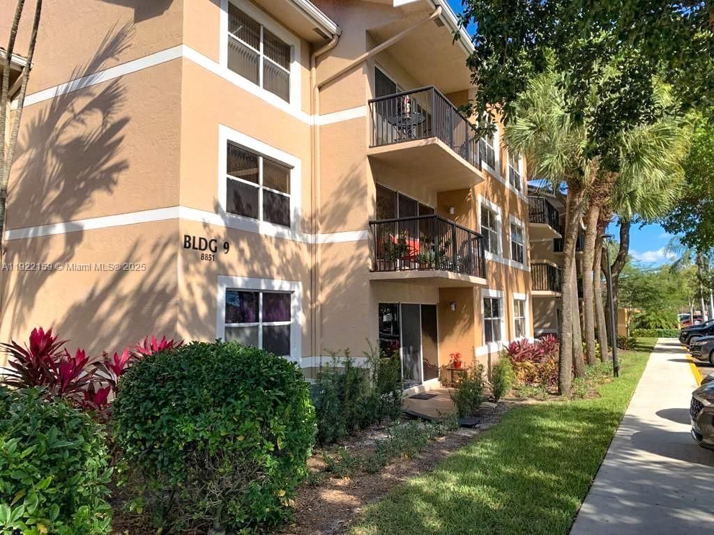 Photo of 8851 Wiles Rd #204, Coral Springs, FL 33067 (MLS # A11922159)