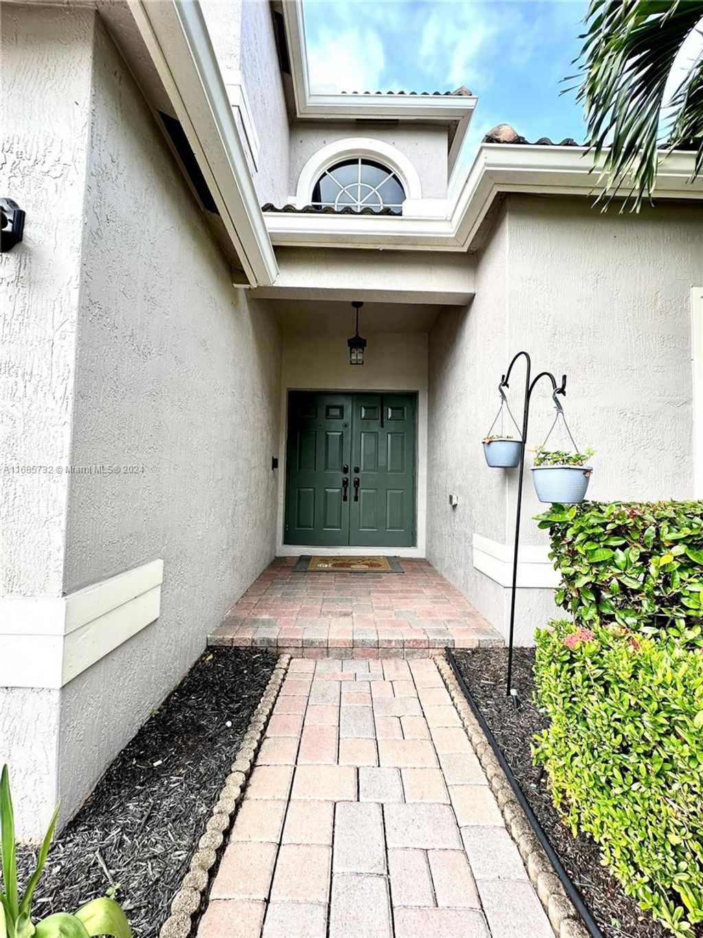 Photo of 4011 NW 62nd Ct, Coconut Creek, FL 33073 (MLS # A11685732)