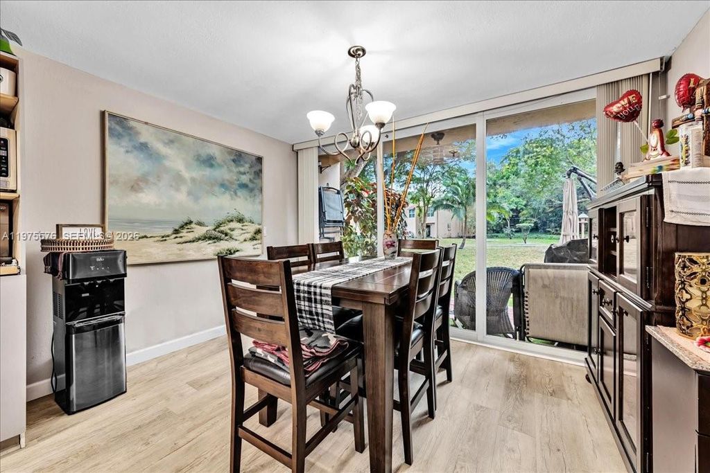 Photo of 9410 Live Oak Pl #110, Davie, FL 33324 (MLS # A11975576)