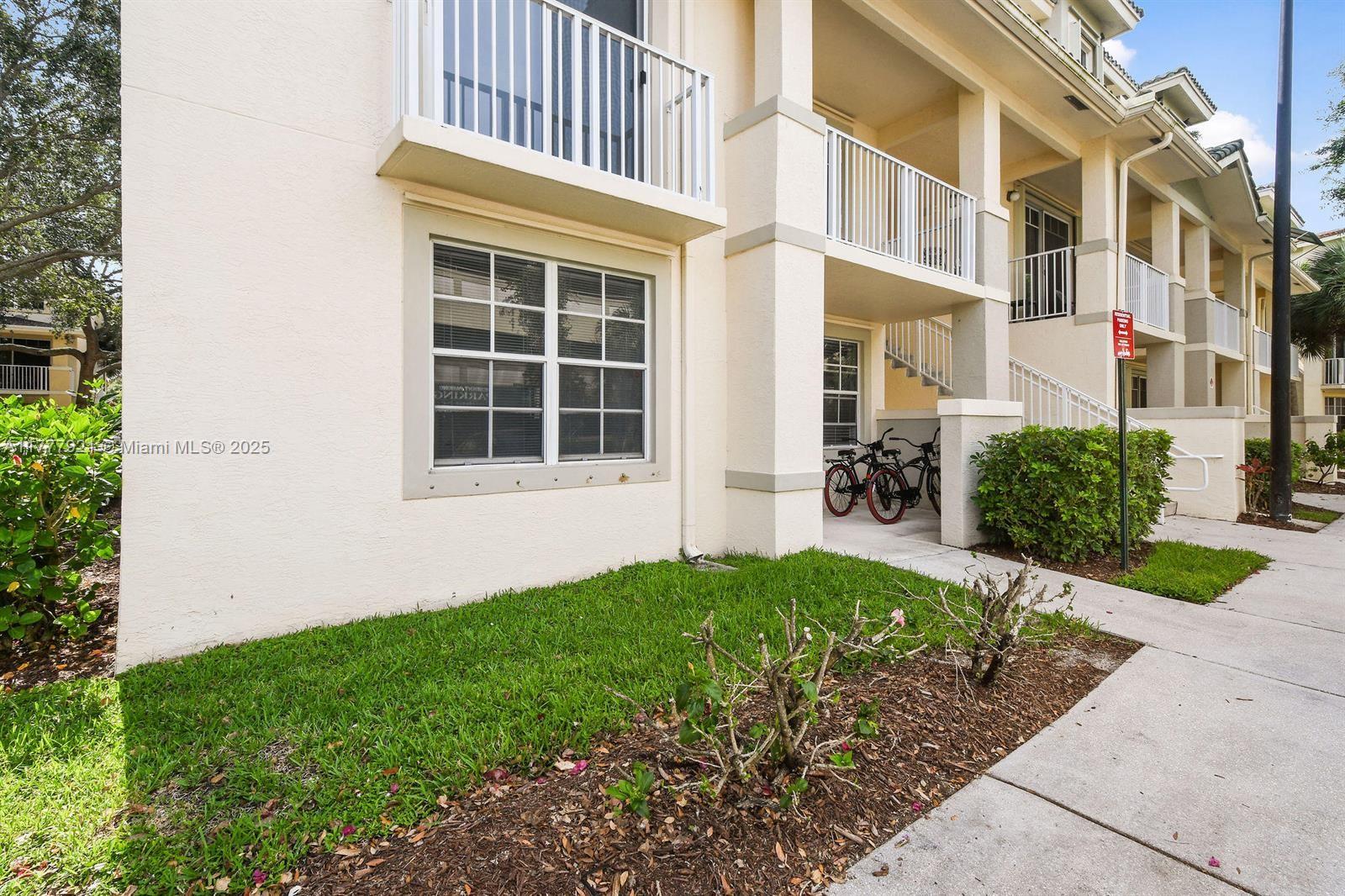 Great two-bedroom, two-bathroom condo located in the desirable Village at Abacoa. This unit features wood laminate floors throughout and has been freshly painted in white, offering a clean and bright atmosphere. The kitchen comes equipped with all necessary appliances, and a washer and dryer are conveniently included within the condo. Enjoy outdoor living with a welcoming front porch and a private back patio. The Village at Abacoa offers walkable access to shops, restaurants, and a local coffee store. Ideally situated just five minutes from I-95 and only ten minutes from the beautiful sands of Jupiter Beach, this location provides both comfort and convenience for South Florida living.