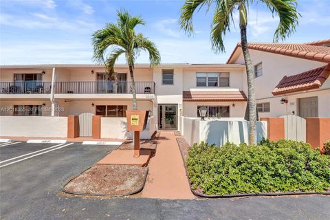 Photo of 3200 Coral Springs Dr #106, Coral Springs, FL 33065 (MLS # A12018355)