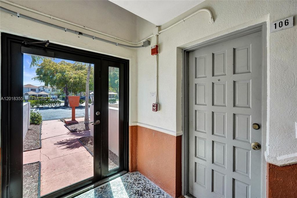 Photo of 3200 Coral Springs Dr #106, Coral Springs, FL 33065 (MLS # A12018355)