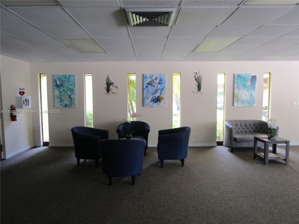 Photo of 5940 NW 64 Th Ave #109, Tamarac, FL 33319 (MLS # A11900598)