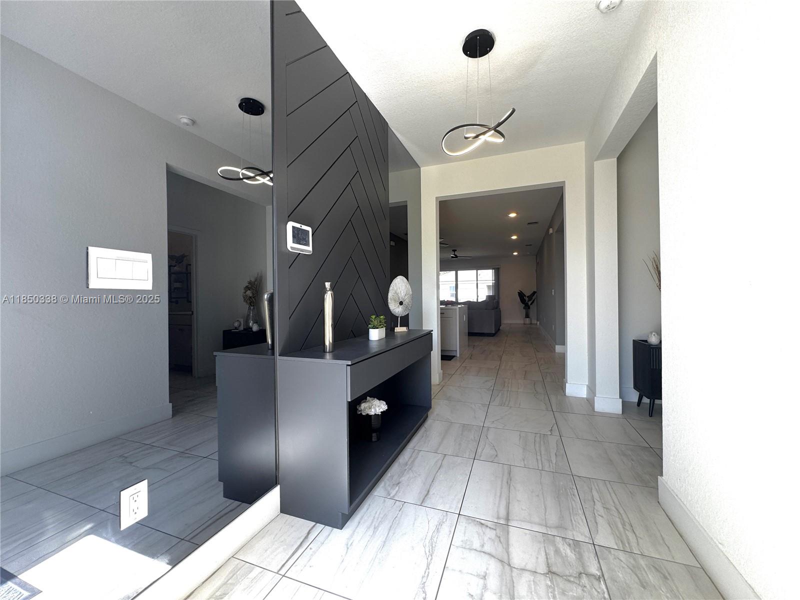 LOWEST PRICE OF THE COMMUNITY! Don't miss this great opportunity, Corner LOT, upgrades, Tesla Charger included on the sale, and more. VACANT and available. BUYERS AGENTS WELCOME