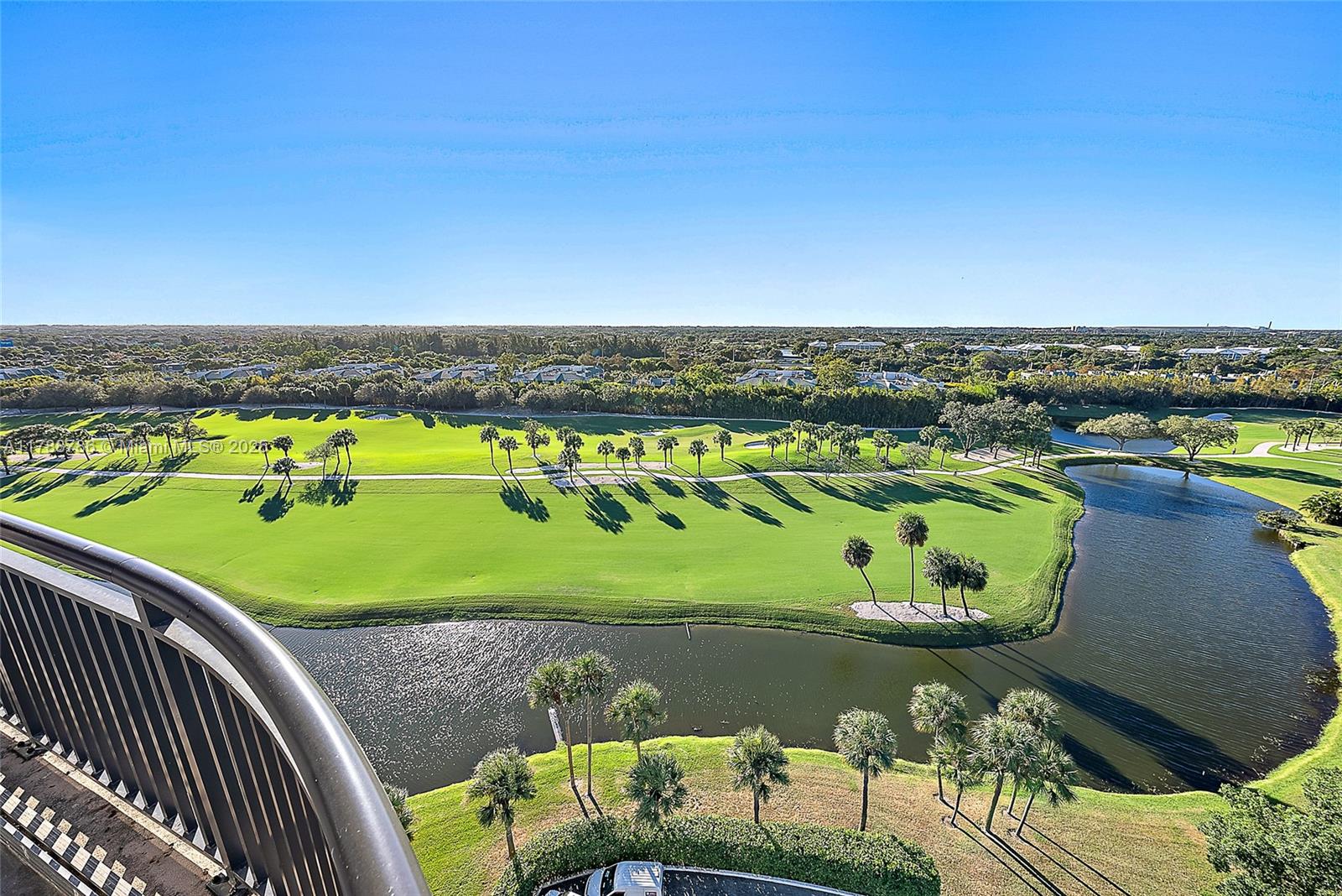 PRICED TO SELL! Perched above the prestigious Dutchman's Pipe golf course, this stunning penthouse offers unrivaled luxury and convenience. Recently stripped to the concrete shell and masterfully renovated, the residence showcases top-tier Wolf and Sub-Zero appliances alongside exquisite designer finishes throughout. This smart home integrates cutting-edge automation for seamless living. Located minutes from vibrant downtown West Palm Beach, residents enjoy full-service amenities including a doorman, guard-gated security, fitness center, and a resort-style pool and spa. This pet-friendly building provides the perfect blend of security, sophistication, and leisure. Experience elevated Florida living with panoramic golf course views and the finest modern luxuries at your fingertips.