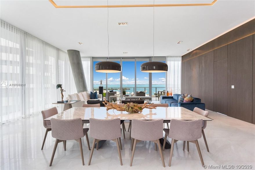 Prime NE Corner unit tastefully finished highlighting the exquisite architectural features of Bjarke Ingels. Marble flooring throughout, wood panels, lighting features, open and bright spaces, 5 bedrooms, 6.5 bathrooms, Family area, kids play - den, service area, Summer kitchen with large deep 1000 sf wrap-around Terrace. High 12 foot ceilings will welcome you from the private elevator. This building offers 2 pools, spa, state of the art gym, Butler, a private restaurant, concierge, GAS stove, and more.