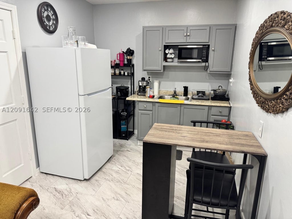 Photo of 7321 Fairway Blvd #1, Miramar, FL 33023 (MLS # A12091642)