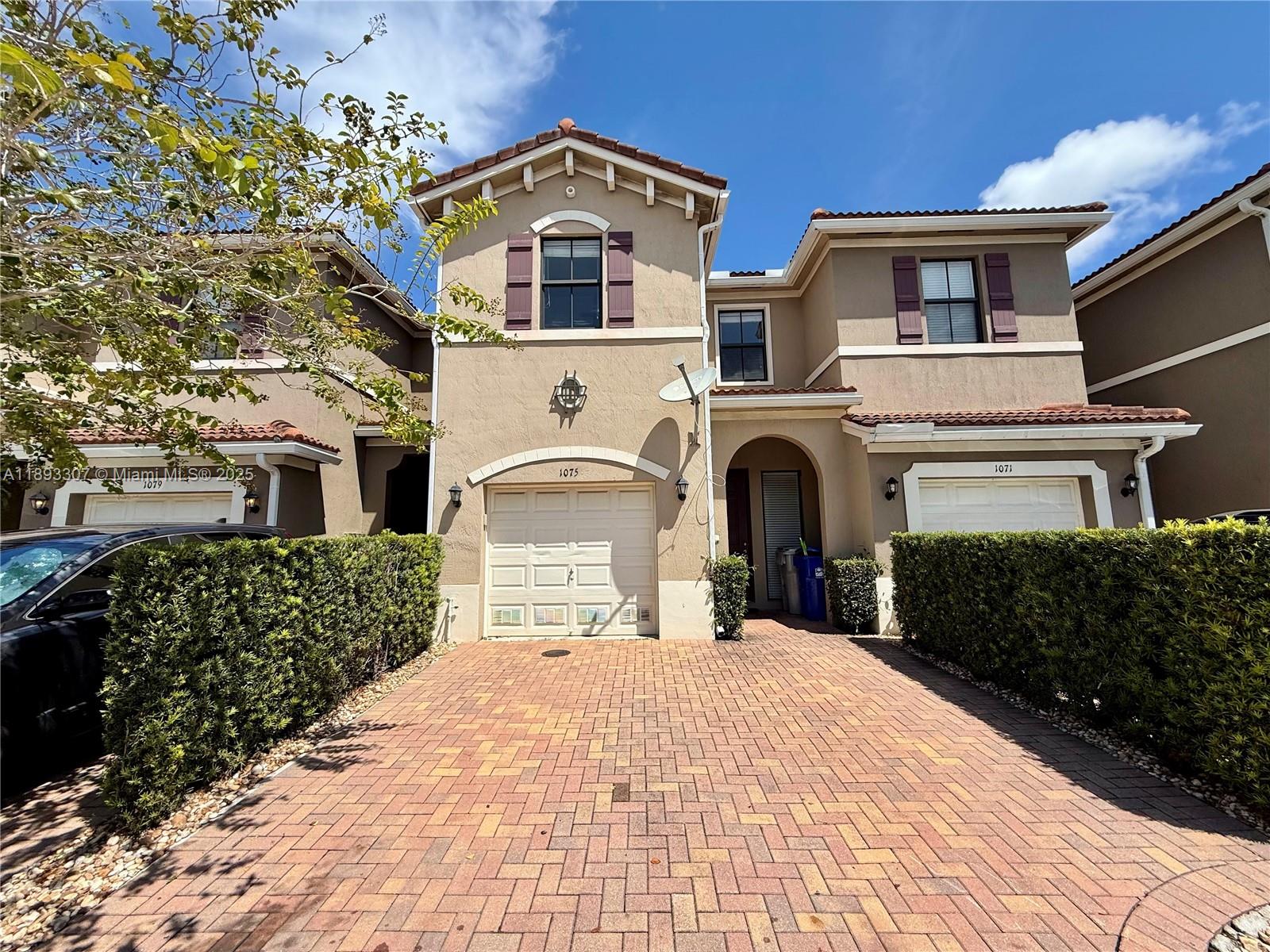 Beautifully updated 3-bedroom, 2.5-bath townhome with stunning lake views in the heart of Pompano Beach! This freshly painted home features a bright open kitchen layout with a cooking island—perfect for entertaining. Enjoy brand-new laminate flooring throughout, walk-in closets, and ample storage. Includes a 1-car enclosed automatic garage plus 2 additional parking spaces. Located in the desirable well-maintained Madison Place community, close to schools, shopping, major highways, and more. Move-in ready.