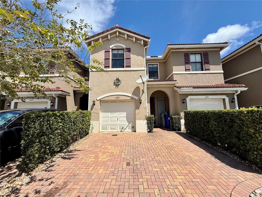 Beautifully updated 3-bedroom, 2.5-bath townhome with stunning lake views in the heart of Pompano Beach! This freshly painted home features a bright open kitchen layout with a cooking island—perfect for entertaining. Enjoy brand-new laminate flooring throughout, walk-in closets, and ample storage. Includes a 1-car enclosed automatic garage plus 2 additional parking spaces. Located in the desirable well-maintained Madison Place community, close to schools, shopping, major highways, and more. Move-in ready.