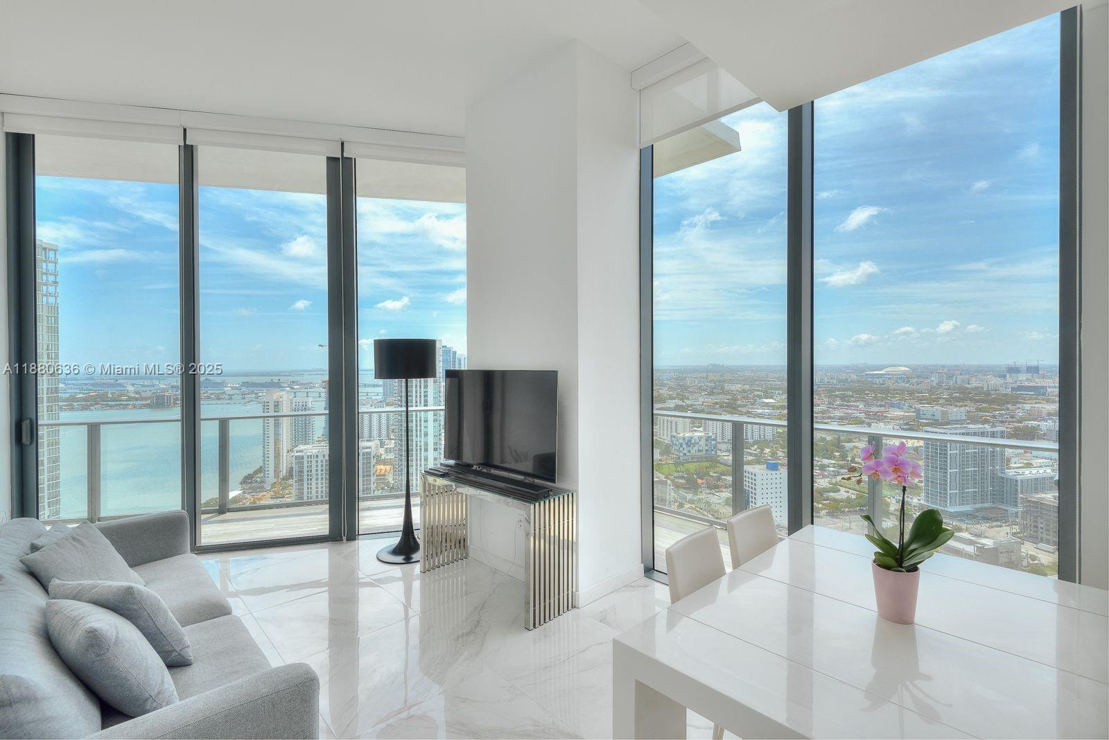 Stunning 3-bedroom, 2 bath residence located on the 40th floor of Paraiso Bayviews in the heart of Edgewater Miami. This modern condo offers floor-to-ceiling windows with breathtaking bay and city views, open-concept kitchen with premium finishes, and spacious bedrooms with ample closet space.
Paraiso Bayviews is a luxury building designed by Karim Rashid, featuring world-class amenities: rooftop pool with panoramic views, state-of-the-art fitness center, spa, sunset pool, tennis courts, BBQ areas, movie theater, billiards room, valet parking, and 24-hour concierge.
Ideally situated just minutes from Wynwood, Midtown, Miami Beach, and Downtown, residents enjoy the perfect blend of comfort, lifestyle, and convenience in one of Miami’s fastest-growing neighborhoods.