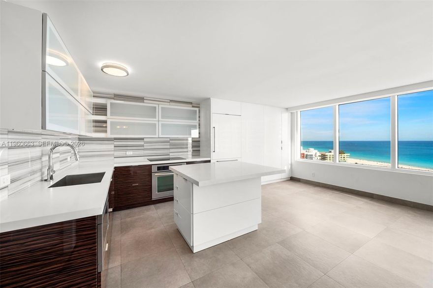 2 bedroom 2 full bath beautifully renovated unit offers modern comfort and smart design throughout. High floor unit with expansive ocean views and bright lights of South Beach. Floor plan has been redesigned to maximize expanded living areas and ocean views. Fully updated with impact windows with electric shades in all rooms. The home has been thoughtfully redesigned for open-concept living, creating a bright and spacious feel ideal for everyday living and entertaining. Two hidden Murphy beds are seamlessly integrated into the design, providing comfortable accommodations for guests without sacrificing style or space. Every detail has been carefully considered, making this unit truly move-in ready. Walking distance to beach, fine dining and south pointe park. Brand new common areas completed and assessments paid in full.