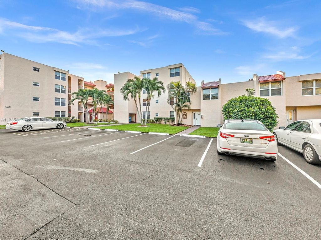 Photo of 9451 Evergreen Pl #104, Davie, FL 33324 (MLS # A11885817)