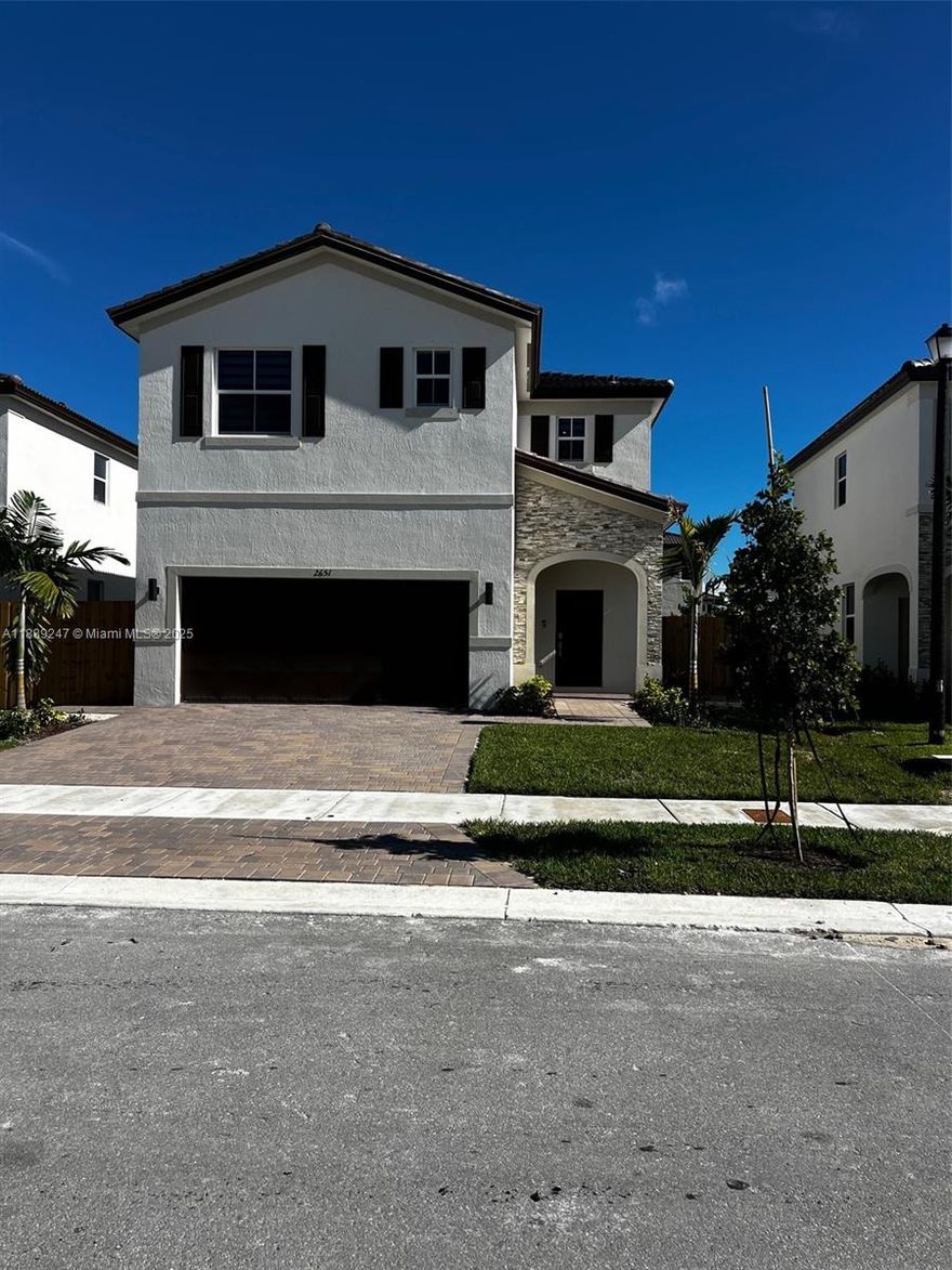 Spectacular Brand-New Single-Family Home in Altamira. Be the first to live in this never-occupied 3-bedroom, 2.5-bathroom home with a 2-car garage. Featuring a spacious open layout filled with natural light, this residence overlooks an oversized fenced backyard complete with a large, paved area and low-maintenance artificial turf—perfect for year-round outdoor enjoyment. The first floor is fully tiled, while the staircase and entire second floor feature PVC wood-look flooring for a modern touch. The contemporary kitchen includes stainless steel appliances, plus a washer/dryer and central A/C for your comfort. Move-in ready! Conveniently located near schools, shopping, dining, and major highways. Association approval required. Please submit CTL fully documented. Vacant and easy to show!