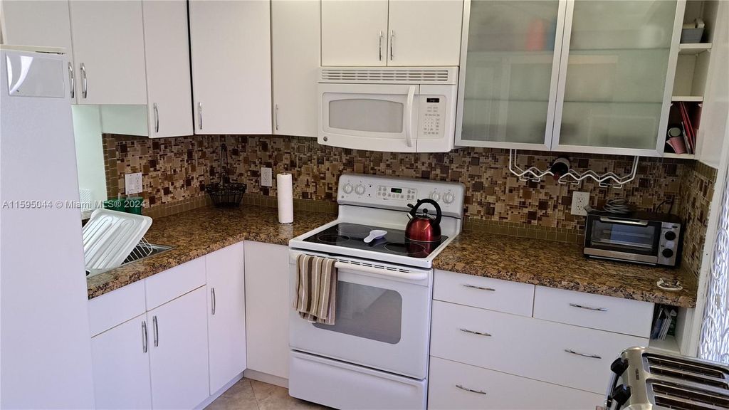 Photo of 500 NE 12th Ave #105, Hallandale Beach, FL 33009 (MLS # A11595044)