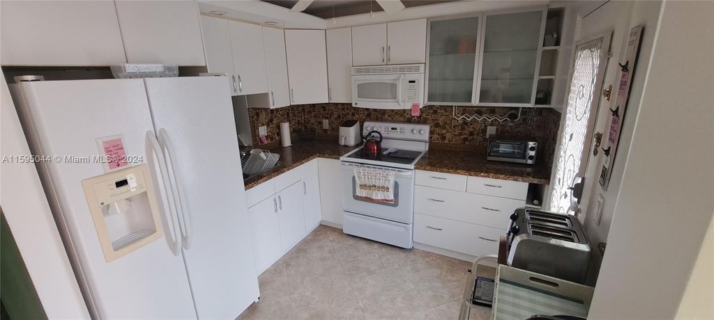 Photo of 500 NE 12th Ave #105, Hallandale Beach, FL 33009 (MLS # A11595044)