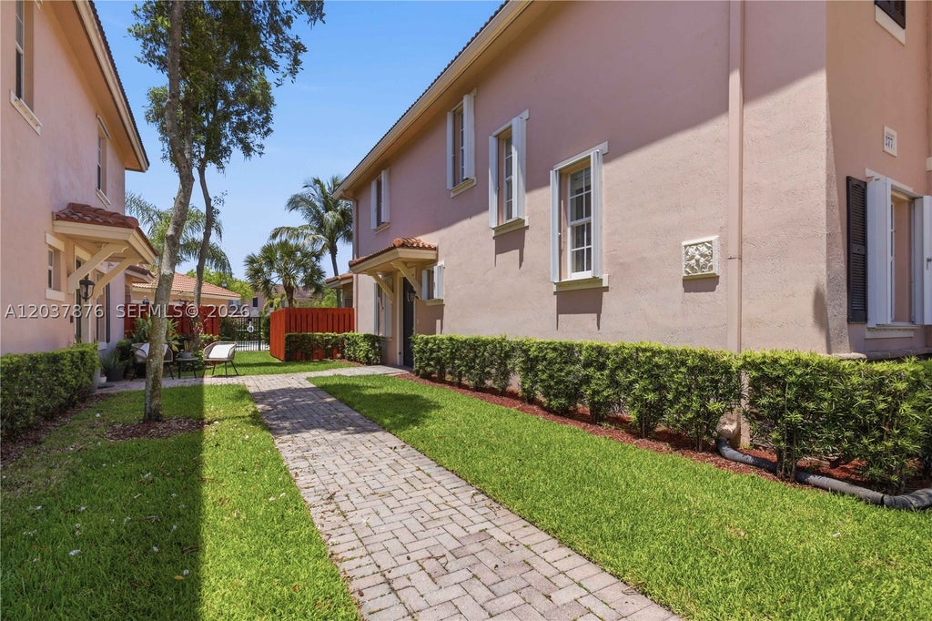 Photo of 277 Las Brisas Cir, Sunrise, FL 33326 (MLS # A12037876)