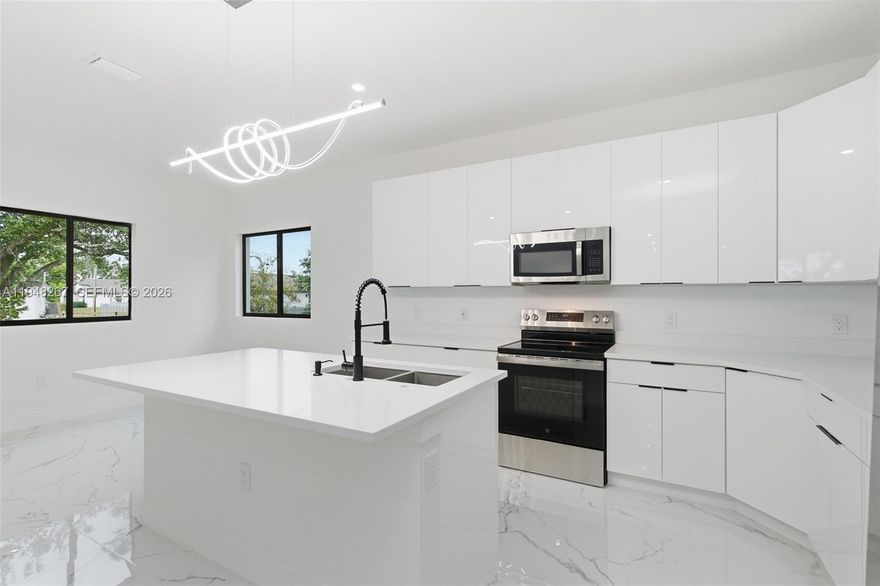 Welcome to this beautifully crafted new construction home located in the desirable residential neighborhood of Mirror Lakes. This thoughtfully designed property offers 3 spacious bedrooms and 2 full bathrooms, blending modern style with everyday comfort.

The home features a contemporary kitchen with sleek modern cabinetry, stainless steel appliances, and a striking modern light fixture above the kitchen island, perfect for both daily living and entertaining. Impact hurricane-rated doors and windows provide peace of mind while enhancing energy efficiency.

Enjoy outdoor living with ample patio space, highlighted by a mature shade tree, ideal for relaxing, hosting gatherings, or enjoying Florida evenings. Additional features include a 2-car garage, a spacious laundry room, and the rare advantage of no association, offering flexibility and freedom.

This open floor plan home combines modern finishes, quality construction, and a quite neighborhood setting; an excellent opportunity for homeowners seeking style, comfort, and convenience.