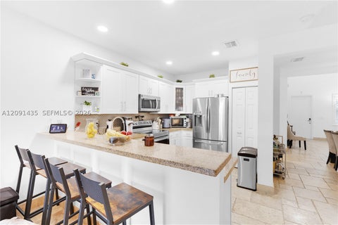 Photo of 7475 NW 116th Ave, Doral, FL 33178 (MLS # A12091435)