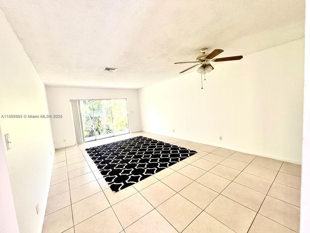 Photo of 3100 Coral Springs Dr #2H, Coral Springs, FL 33065 (MLS # A11891691)