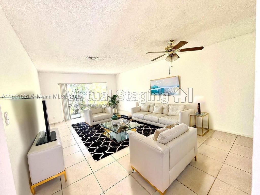 Photo of 3100 Coral Springs Dr #2H, Coral Springs, FL 33065 (MLS # A11891691)