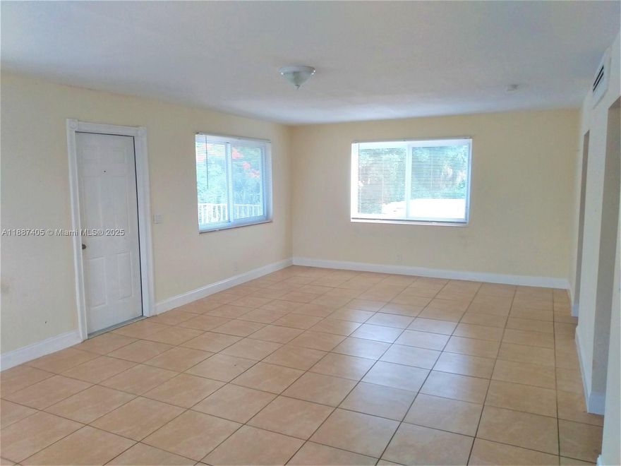 Rapid Approval. Top Floor Unit Spacious 3-bedroom, 1 bathroom unit. Tenant Pays all utilities, water, sewer, and electricity. Tenant required to obtain Renters Insurance. East of I-95. This location is Conveniently located 10-11 minutes away from the public beach access, 7-minute drive to Outlet Shopping, 5-8 minutes commute to Downtown West Palm Beach where you may explore Bars, Restaurants and a progressive nightlife. Unit has impact windows throughout, tile flooring, granite counters in kitchen. Property has central air conditioning, and the property is completely fenced.