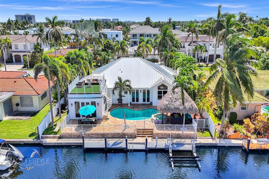 WATERFRONT LUXURY PROPERTY WITH SUNSET ROOFTOP TERRACE !!
Direct ocean access with no fixed bridges 4-bedroom, 4-bath single-family home with private dock and boat lift.(Max 10,000 lbs). Three of the four bedrooms feature ensuite bathrooms, offering privacy and comfort. The gourmet-style kitchen is open to the main living area, perfect for family gatherings and entertaining. All windows and doors are impact-resistant for added security and peace of mind. The outdoor entertaining space is absolutely stunning, complete with a private heated pool, spa, palapa, and a rooftop terrace for breathtaking views. There's plenty of interior storage, along with a large outdoor shed for extra convenience. Circular driveway, and ample parking, this home is not to be missed!