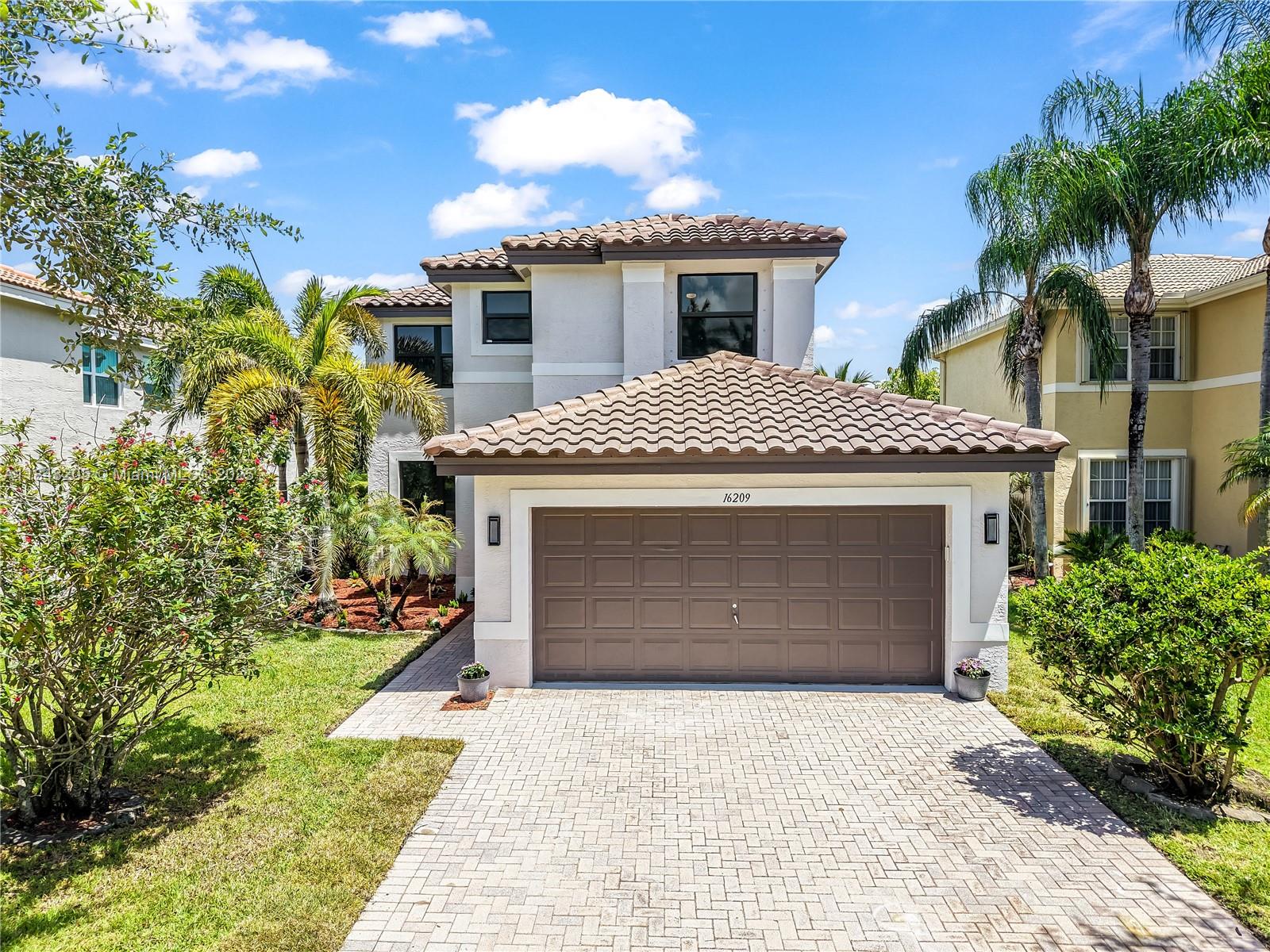 Fully Renovated 4BR/3BA Lakefront Home – Move-In Ready! New roof (2025), hurricane-impact windows and doors (2025), new HVAC system and water heater (2025), and luxury vinyl plank flooring (2025) throughout. Kitchen fully renovated with granite countertops, cabinets, and smart stainless-steel appliances All three bathrooms newly updated, including a spa-like primary suite for ultimate relaxation. Conveniently, there’s a guest bedroom and full bath on the first floor. Step outside to your private backyard oasis with stunning lake views, ideal for entertaining or peaceful evenings. Additional upgrades include new epoxy-coated garage floors. Centrally located near top-rated schools, shopping, dining, and major highways. Don’t miss this turnkey waterfront gem. Schedule your showing today!
