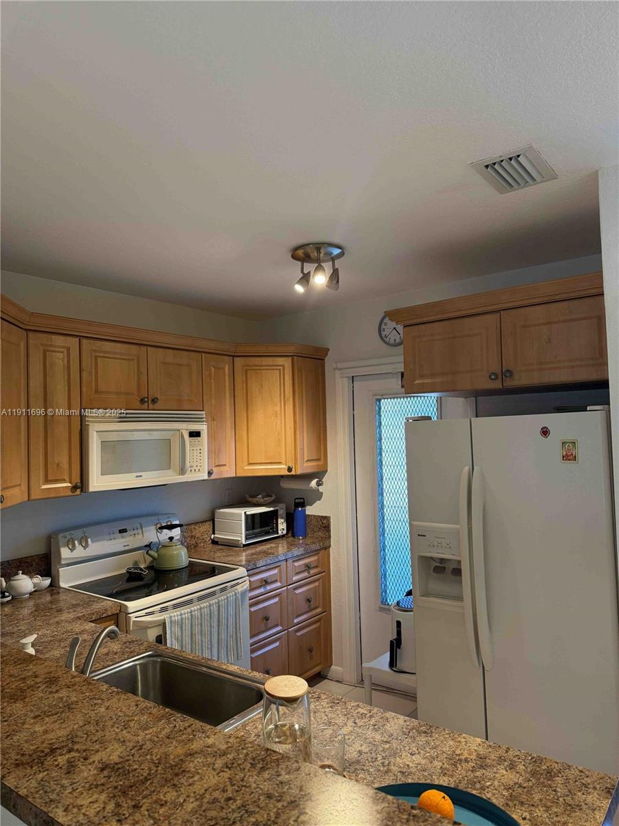 MELALEUCA GARDENS CONDO - Residential Lease