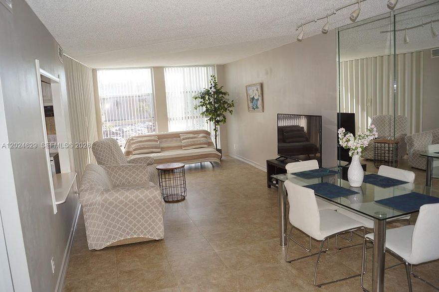 Beautiful and spacious 2 bedroom with a 1.5 bath making it convenient to host guests. Upgraded kitchen and bathrooms with a 1 bedroom plus den ( currently converted into a second bedroom). This Desoto condo features elegant porcelain flooring throughout and offer several closets for nice storage including an spacious walking closet. This condo offers natural lighting and the most spacious kitchen of the area. Don't miss out the amazing resort-amenities at this well-maintained community: Heated pool and tennis courts. Enjoy the short walk to Walmart, and shops, and not to mention the beach which is just 6 minutes away by car. Short distance to Fort Lauderdale International airport and to the top dining options of Hallandale and Hollywood Beach.