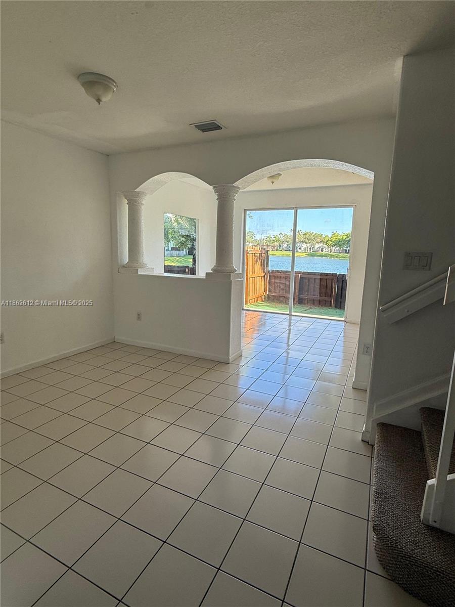 Three bedroom , 2.5 bath beautiful lake view townhome in gated community with 24 hr security, club house and pool. Near shopping, schools and the keys. Wake up every morning overlooking this spectacular view. First and deposit required. Please text for showing information
