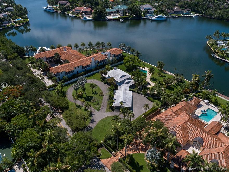 Introducing for the first time in over 50 years, the finest property available in Gables Estates to design and build a waterfront masterpiece! Located in one of the most coveted, guard gated communities that Miami has to offer, this 65,000 sq/ft property encompasses the essence of waterfront living!  The back of the property faces South, towards a wide lagoon with breathtaking views and southeastern breezes, providing ideal sunlight and ample privacy.  A yachtsman’s dream, this vast property has 200 ft of water frontage and is located on a wide, deep water turning basin with unobstructed access to Biscayne Bay! The home, built in 1963 includes 5 bedrooms, three full baths and one half bath.  Renovate, expand or redevelop this amazing waterfront property into the home of your dreams!