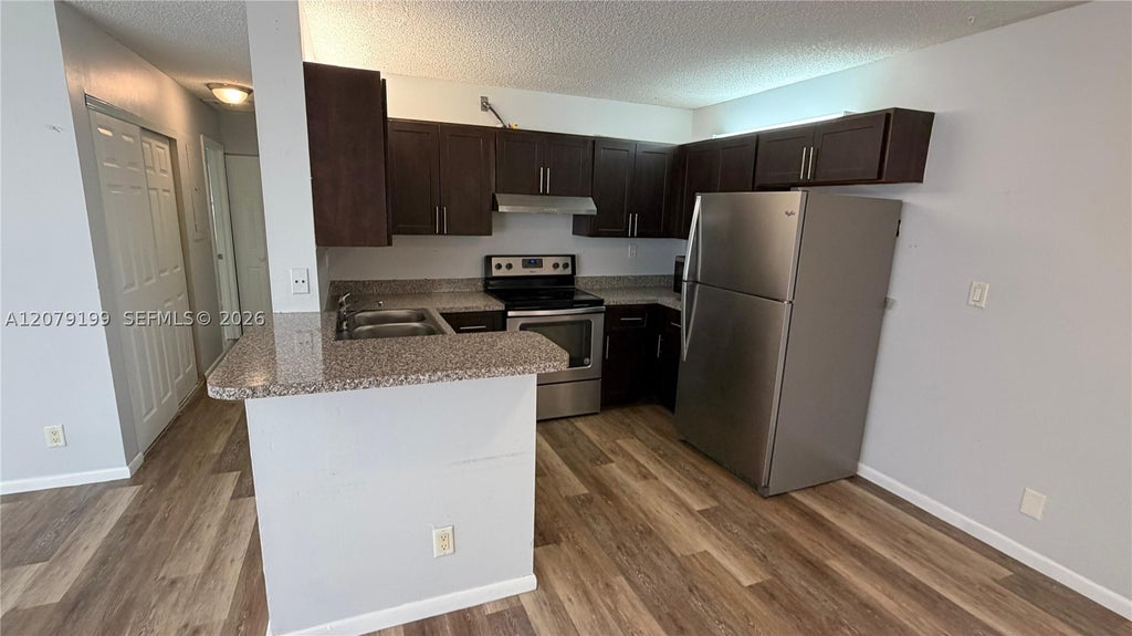 Photo of 11641 Royal Palm Blvd #11641, Coral Springs, FL 33065 (MLS # A12079199)