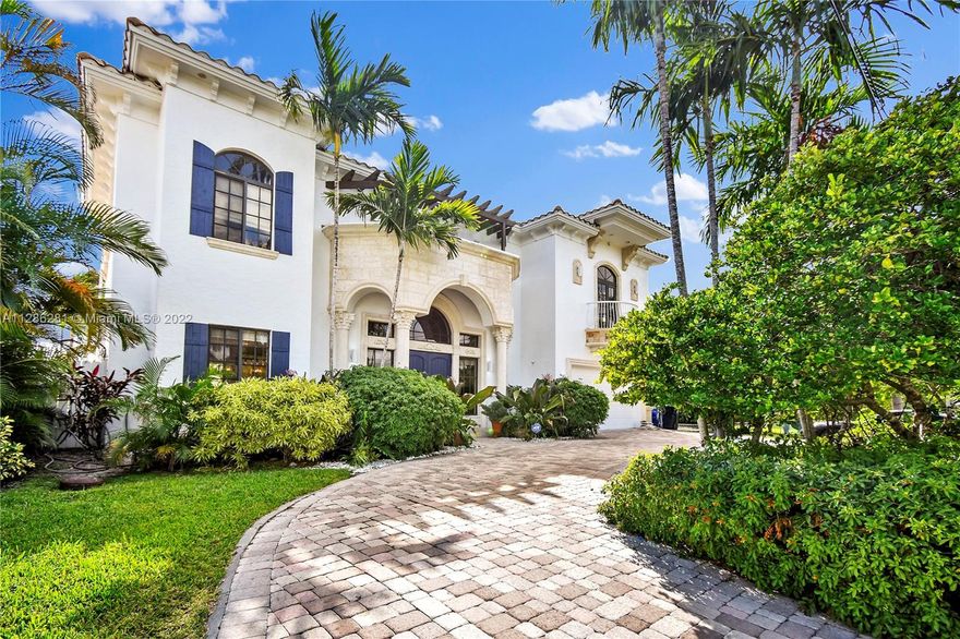 This beautiful newly bright painted mansion on the water is a 2 story home and located in the middle of a quiet and peaceful cul-de-sac super private family-driven neighborhood. Spacious kitchen with new installed white quartz countertop and 3 modern remodeled bathrooms . Impressive views from multiple balconies and windows overlooking the canal . Three strategically located wide  balconies which let you enjoy sunrise and sunset from all angles. The south exposure of the Tropical backyard guaranty full enjoyment of direct sun on the pool. Beautiful boat deck direct on the water. One fixed bridge 15 foot. layout for any-kind of inside and outside entertaining with a beautiful boat deck direct on the water. Luscious and tropical pool and palm trees all around.