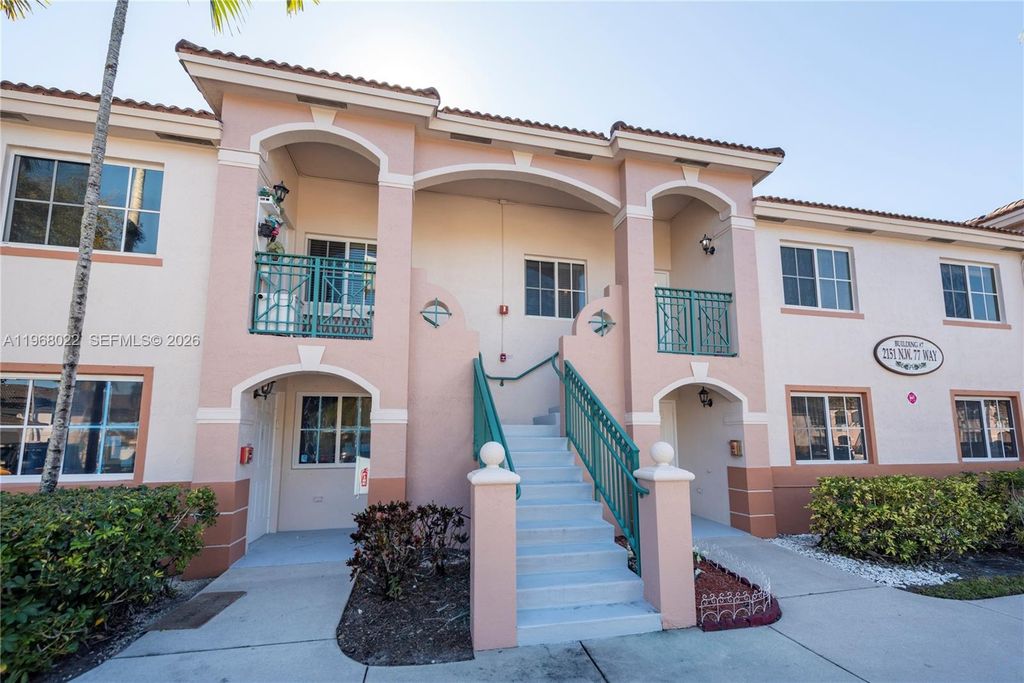 Photo of 2151 NW 77th Way #203, Pembroke Pines, FL 33024 (MLS # A11968022)