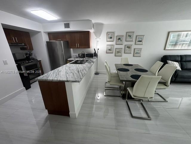 9499 Collins Ave 207