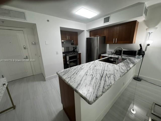 9499 Collins Ave 207