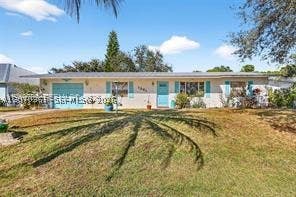 Photo of 1261 SE Mendavia Ave, Port St Lucie, FL 34952 (MLS # A12070361)