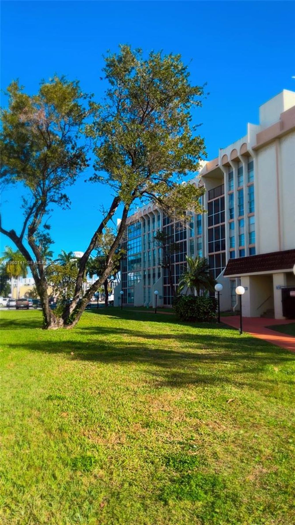 Photo of 701 Three Islands Blvd #201, Hallandale Beach, FL 33009 (MLS # A11960141)