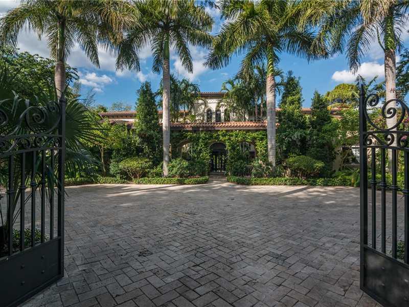 Welcome to this magnificent jewel in North Pinecrest! Iron gates open to exquisitely landscaped loggia & courtyard entrance! See straight thru to heated pool w/many outdoor living areas w/summer kitchen & tropical foliage. Uberlux master, 2 walk-in closet s and office, guest suite w/pr ent. Top Chef kitchen, formal living and dining rooms, elevator, playroom, gym. 2nd FL balcony, wired music! Epitomizes gracious living. Also for rent. (MLS# A2015292).