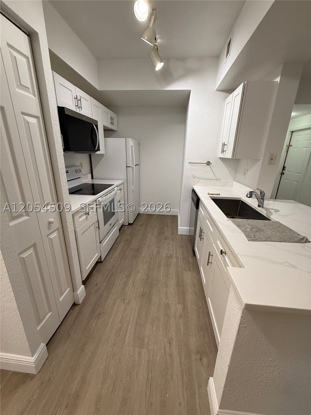 Photo of 2500 Centergate Dr #104, Miramar, FL 33025 (MLS # A12054509)
