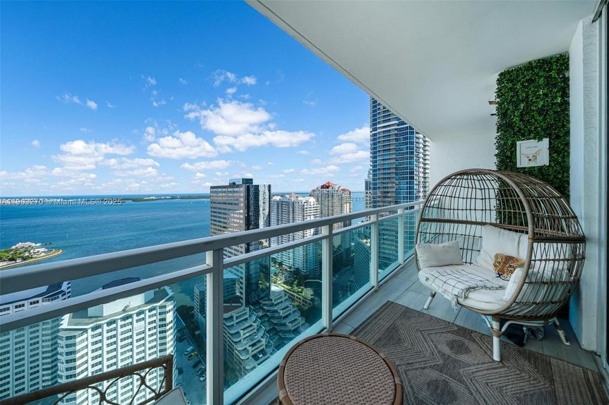 Enjoy direct water views from this remodeled home at The Plaza on Brickell, offering a front-row position to Miami’s skyline. The entry opens to a stunning kitchen with a quartzite waterfall island, farmhouse sink with brushed gold tone fixtures, modern cabinetry, stainless-steel kitchen appliances, and LG ThinQ washer & dryer. Porcelain flooring flows throughout, leading to two bedrooms, each with a walk-in closet. A private balcony invites sunrise coffee or evening relaxation. An exclusive collection of amenities awaits, including two infinity pools, hot tub, meditation garden, spa, newly upgraded gym, movie theater, business center, and 24-hour reception, valet, and security. Located steps from Brickell’s top dining, shopping, entertainment, and waterfront parks. 12-month minimum lease.